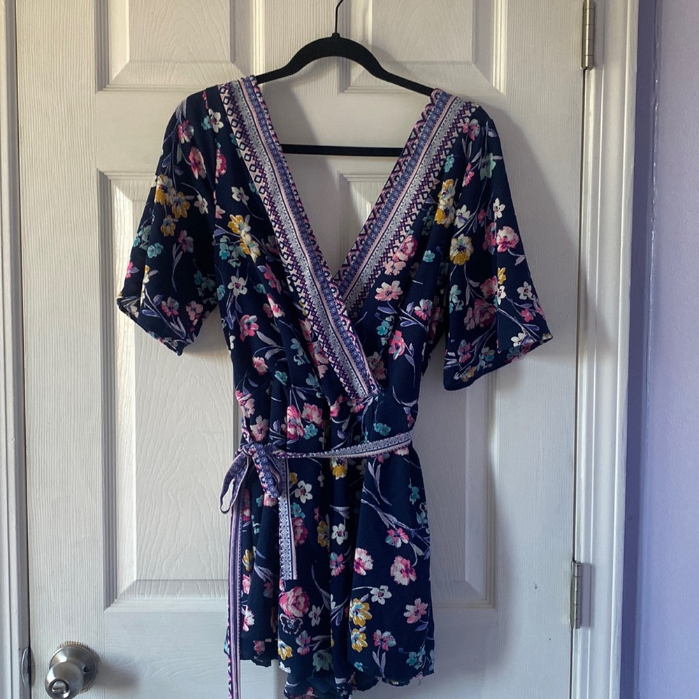 Francesca’s blue floral romper. Size L